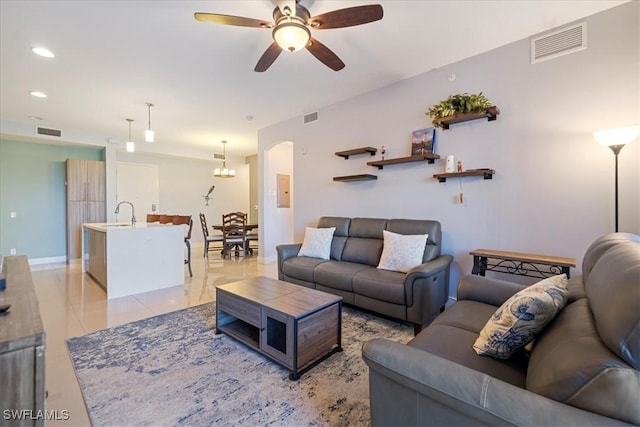 living room featuring ceiling fan