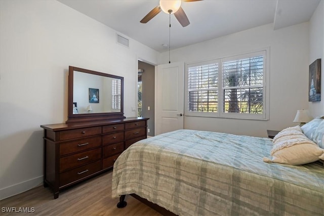 bedroom featuring ceiling fan and hardwood / wood-style floors