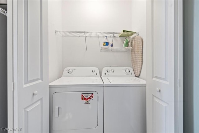 laundry area with washer and dryer