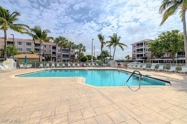 view of pool featuring a patio