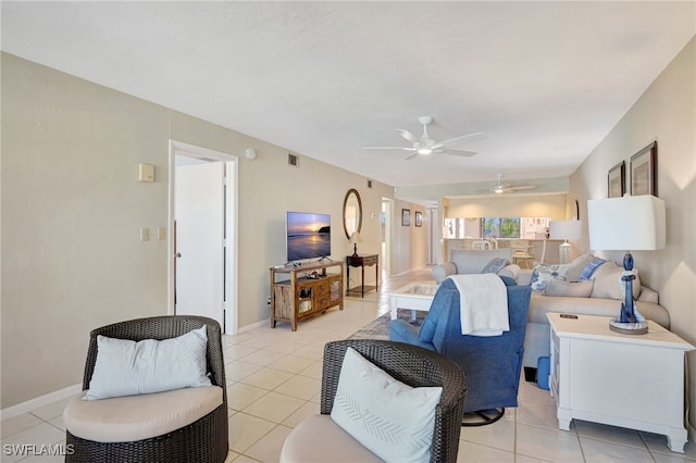 tiled living room featuring ceiling fan