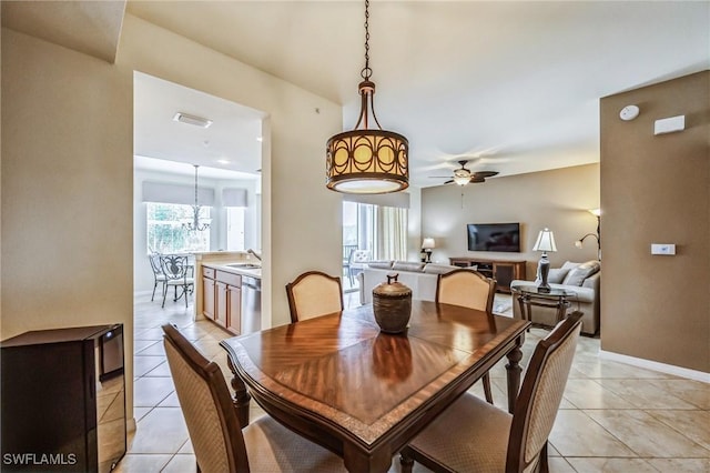 tiled dining room with ceiling fan