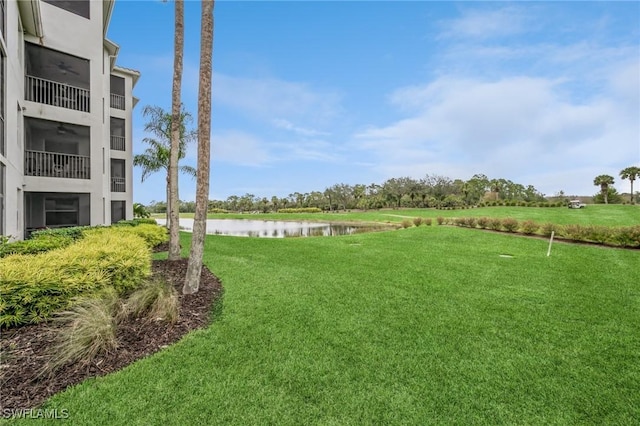 view of yard featuring a water view