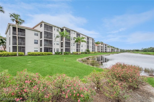 view of building exterior featuring a water view