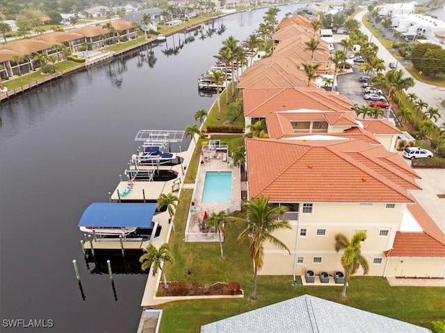 bird's eye view with a water view