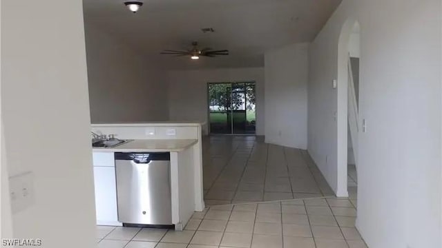 kitchen with ceiling fan, light tile patterned floors, and dishwasher