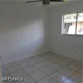 view of tiled spare room