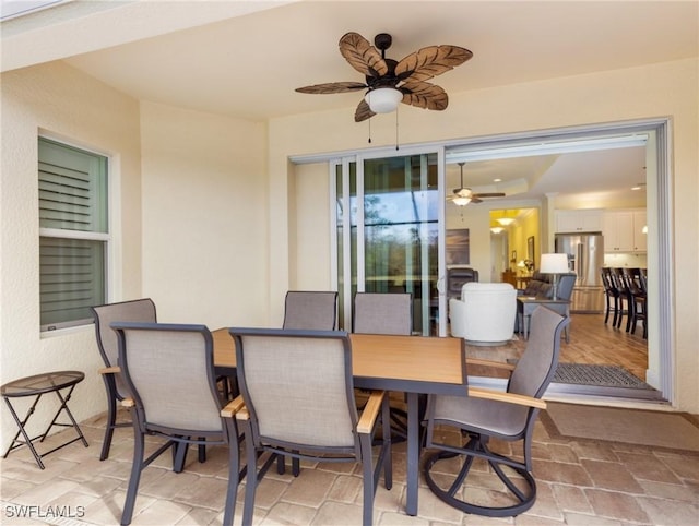 dining area with ceiling fan