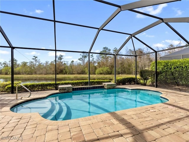 view of swimming pool featuring a patio, a water view, and a lanai