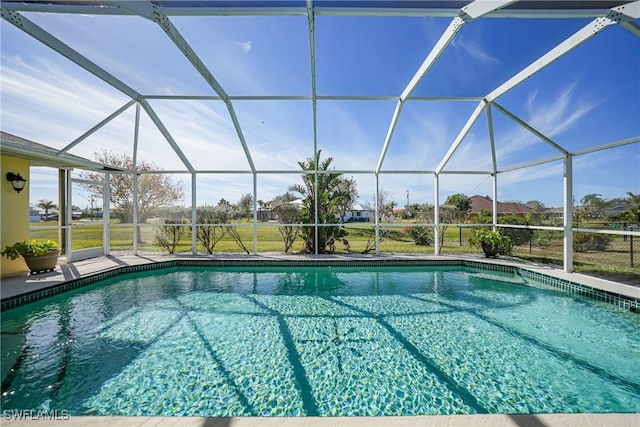 view of pool with a lanai