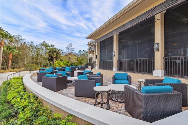 view of patio / terrace with a sunroom and an outdoor hangout area