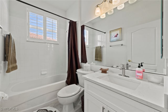 full bathroom with tile patterned flooring, shower / tub combo, vanity, and toilet