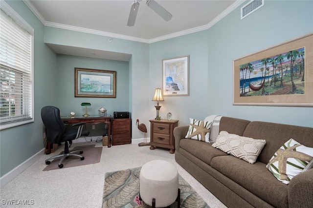 office space with ceiling fan, crown molding, and carpet flooring