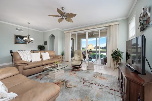 living room featuring light tile patterned floors, ceiling fan with notable chandelier, and crown molding