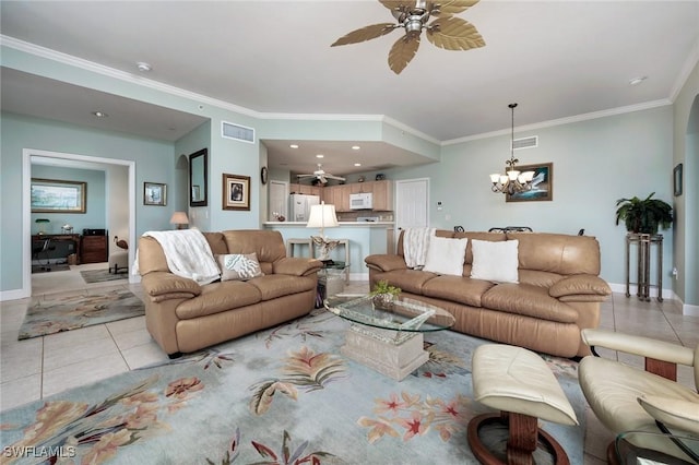 living room featuring ceiling fan with notable chandelier, ornamental molding, and light tile patterned flooring