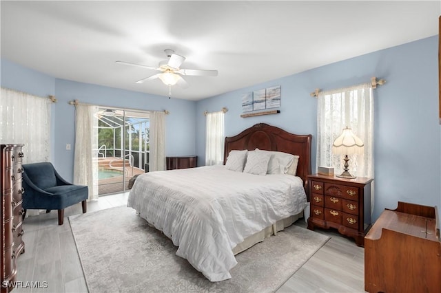 bedroom with ceiling fan, light hardwood / wood-style flooring, and access to outside