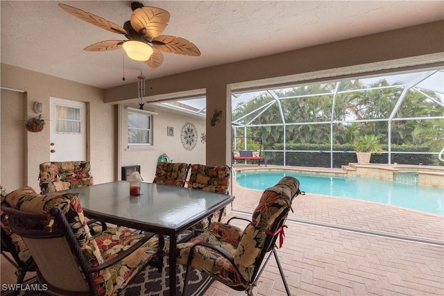 view of pool with ceiling fan