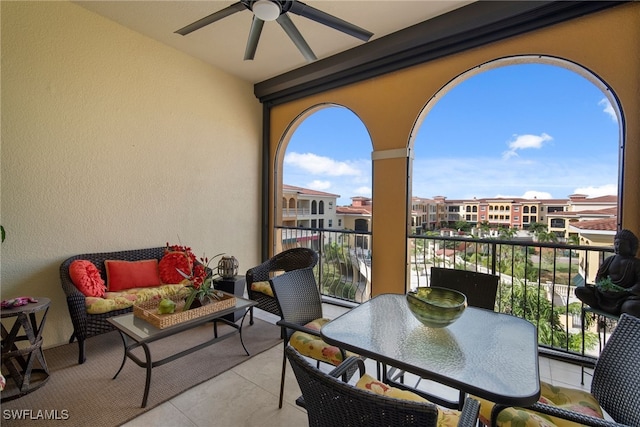 balcony with ceiling fan and an outdoor hangout area