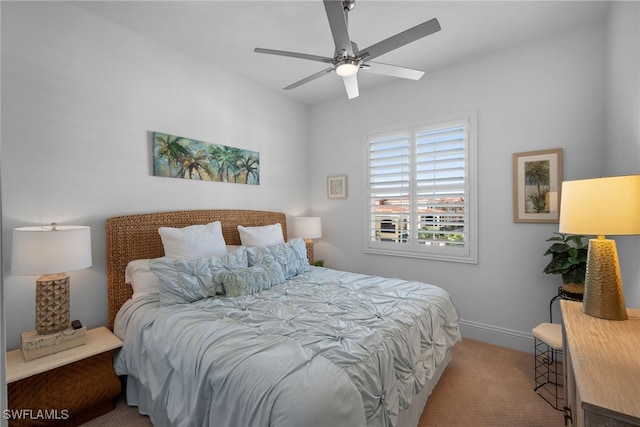 carpeted bedroom featuring ceiling fan