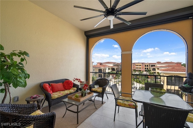 balcony featuring ceiling fan