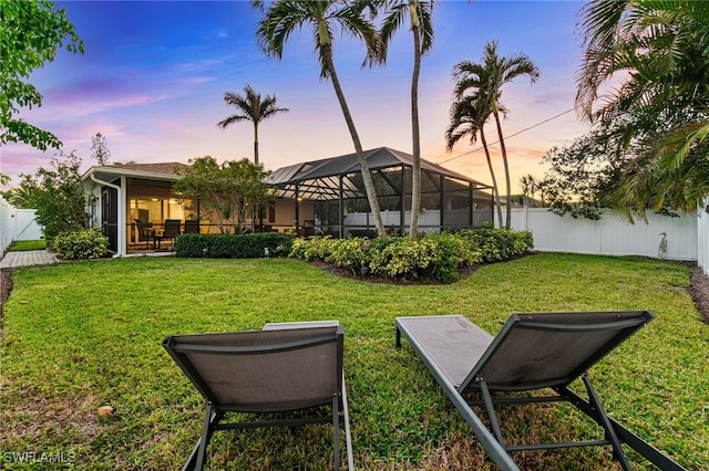 yard at dusk with a lanai