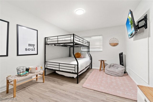 bedroom with light wood-type flooring