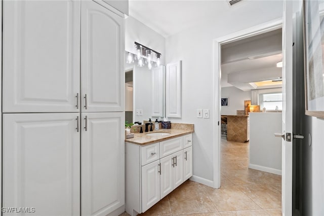 bathroom with vanity and tile patterned floors