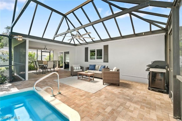 view of pool featuring an outdoor hangout area, a patio, and ceiling fan