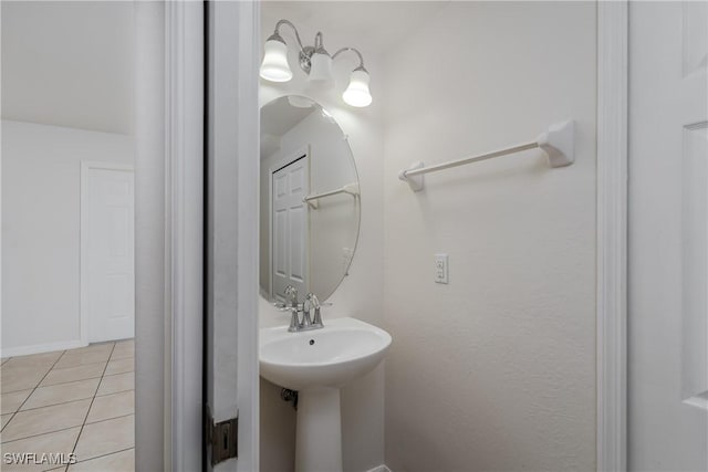 bathroom with tile patterned flooring