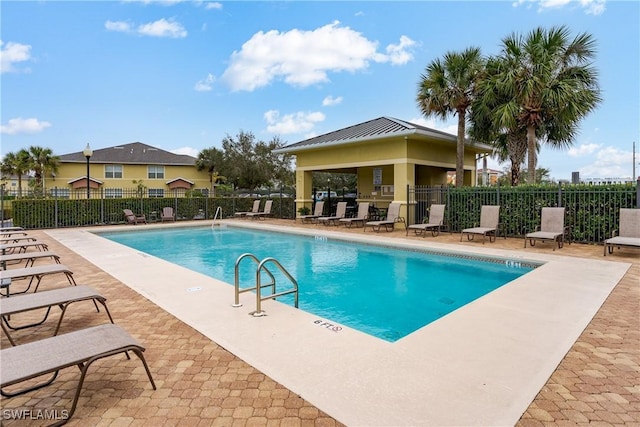 view of swimming pool with a gazebo and a patio area