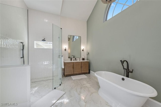 bathroom with vanity, lofted ceiling, and separate shower and tub