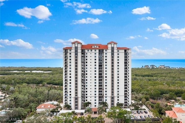 view of building exterior featuring a water view