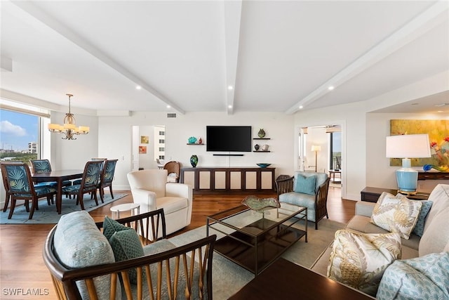 living room featuring beam ceiling, a chandelier, and hardwood / wood-style flooring