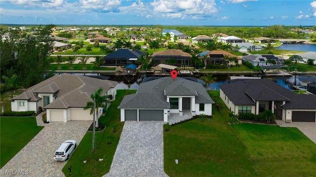 drone / aerial view with a water view