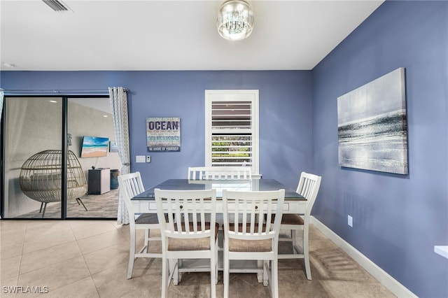 dining room featuring light tile patterned flooring