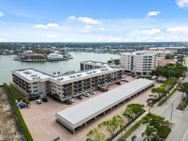 drone / aerial view with a water view