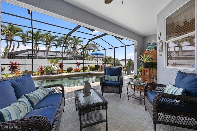 view of patio / terrace with outdoor lounge area, a fenced in pool, and a lanai