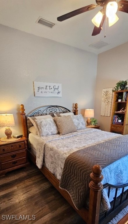 bedroom featuring ceiling fan and dark hardwood / wood-style flooring