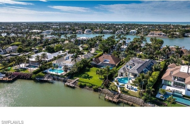 drone / aerial view with a water view