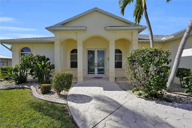 back of property with french doors