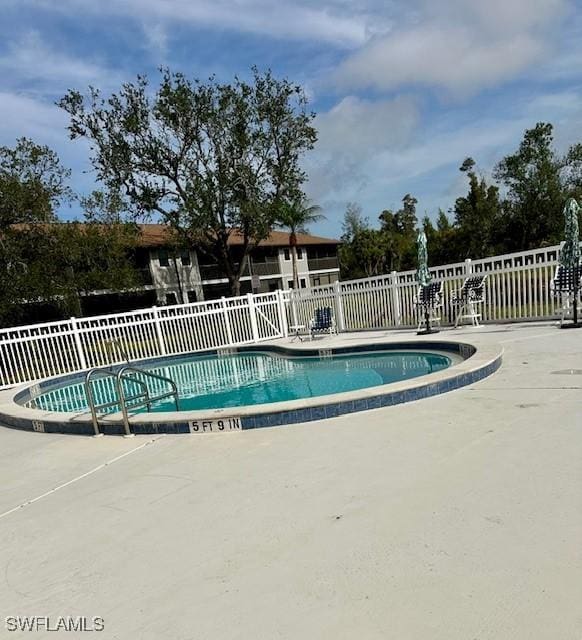 view of pool with a patio