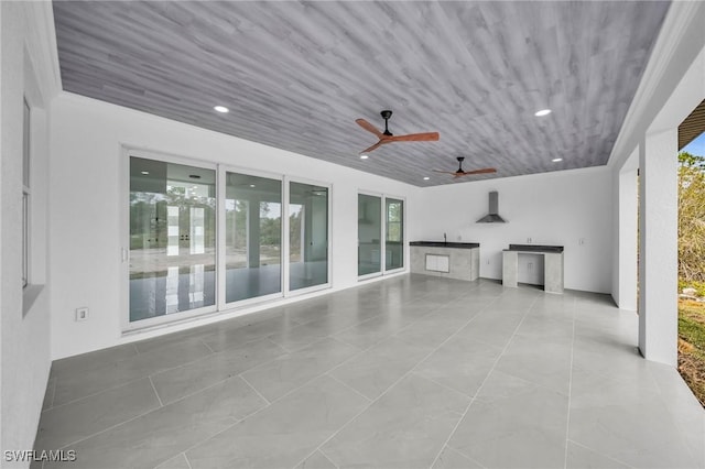 view of patio / terrace featuring ceiling fan