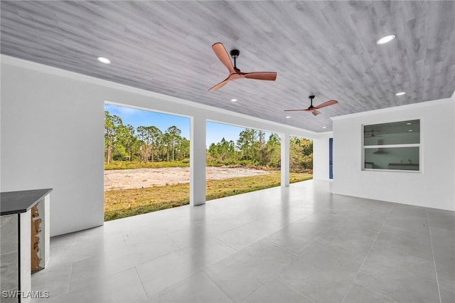 view of patio with ceiling fan