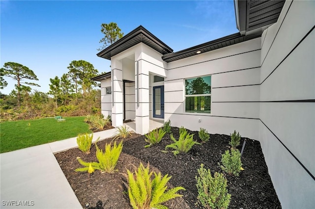 view of home's exterior featuring a lawn