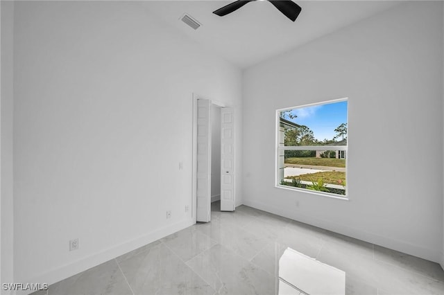 unfurnished bedroom featuring ceiling fan and high vaulted ceiling