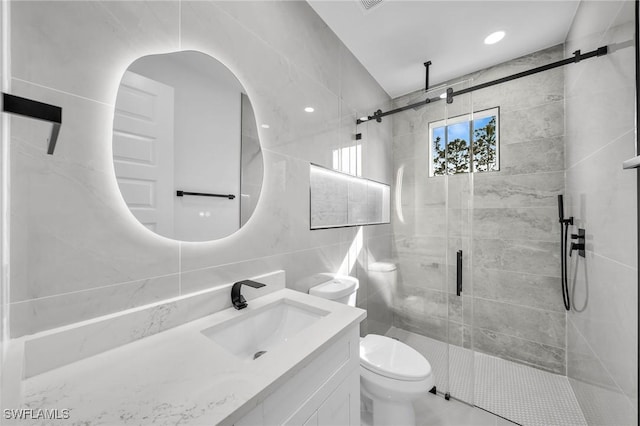 bathroom featuring toilet, decorative backsplash, tile walls, an enclosed shower, and vanity