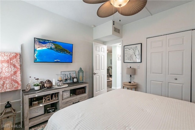 bedroom featuring wood-type flooring, a closet, and ceiling fan