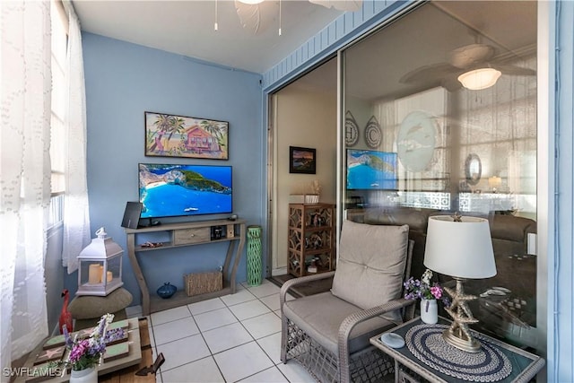 sitting room with light tile patterned flooring