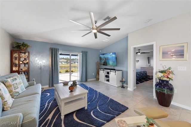 living room with light tile patterned floors, vaulted ceiling, and ceiling fan