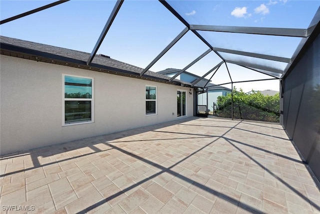 view of patio / terrace with glass enclosure